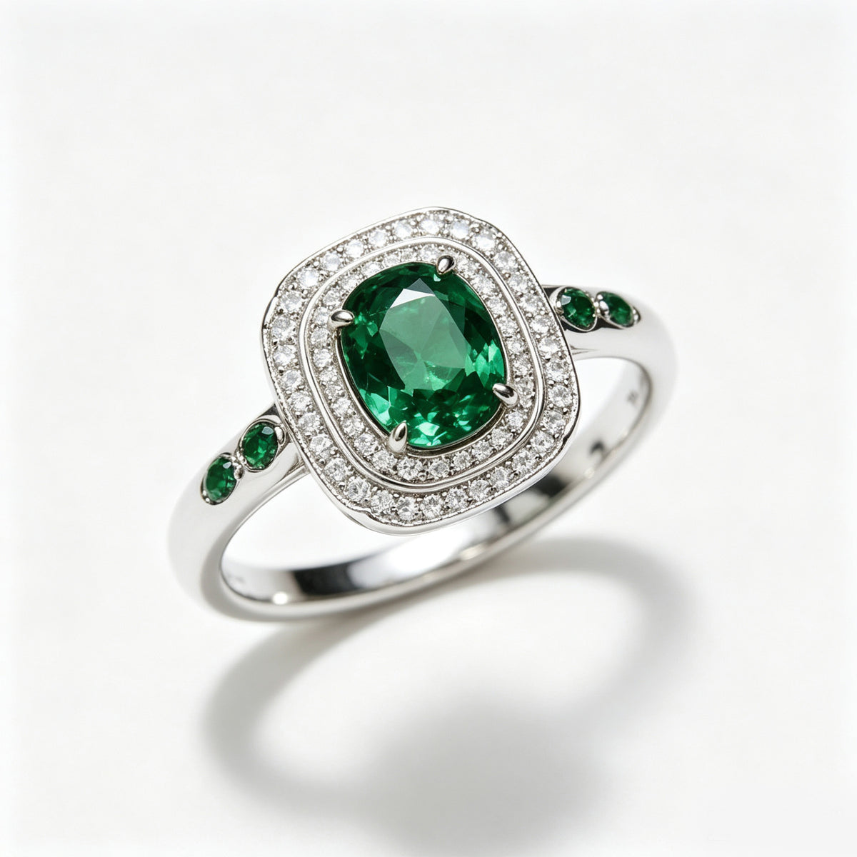 Oval Emerald Double Halo Accent Silver Ring